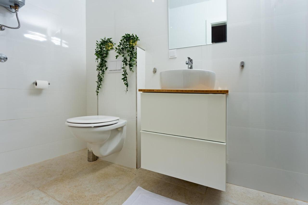 חוואר Apartment And Studios Happy Place מראה חיצוני תמונה